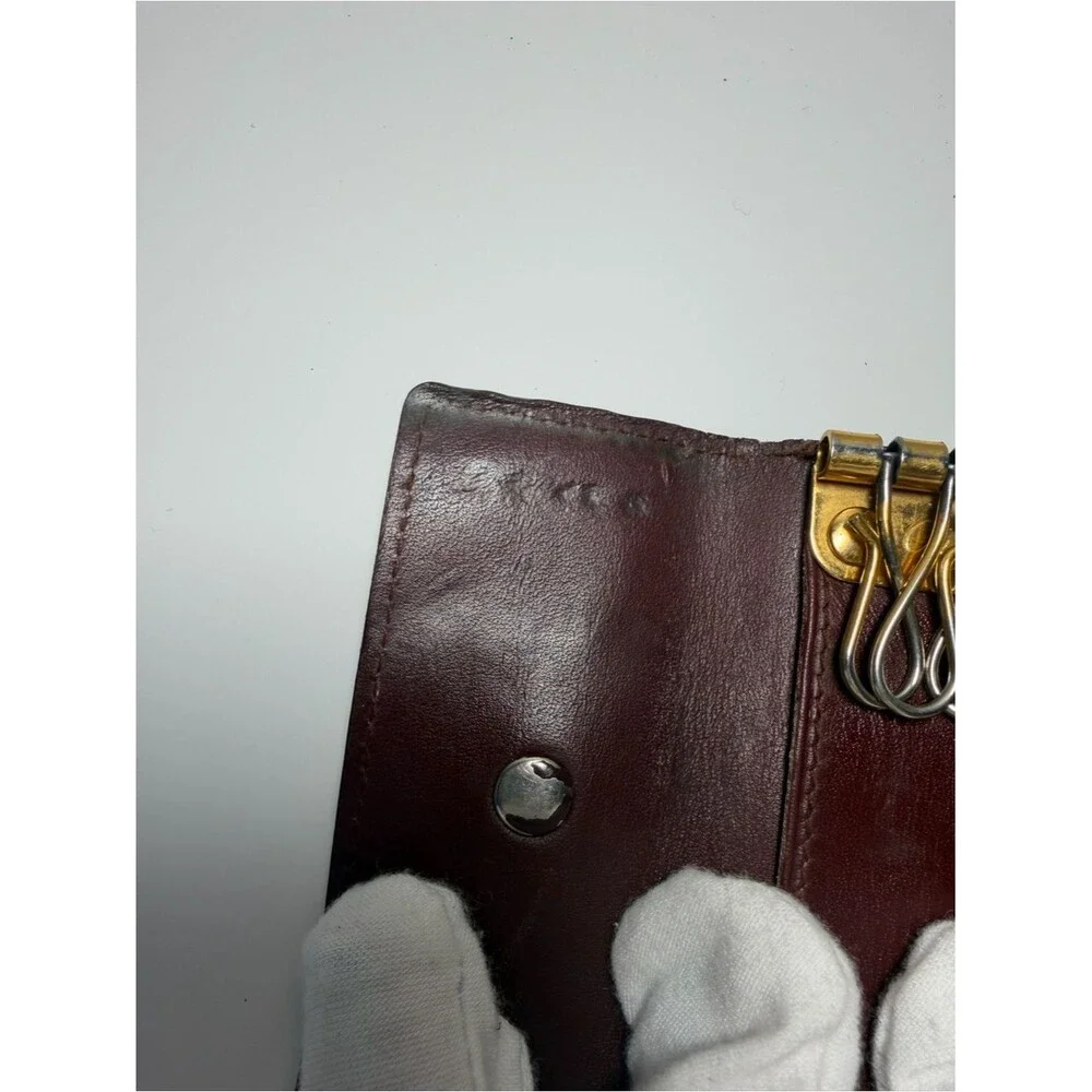Cartier Brownish Red Leather Card Holder with Gold Corner Accents